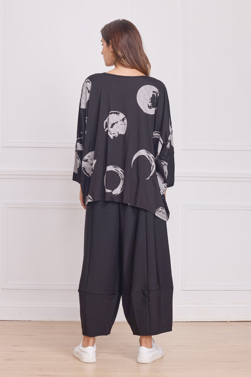 Blouse femme noire à motifs cercles