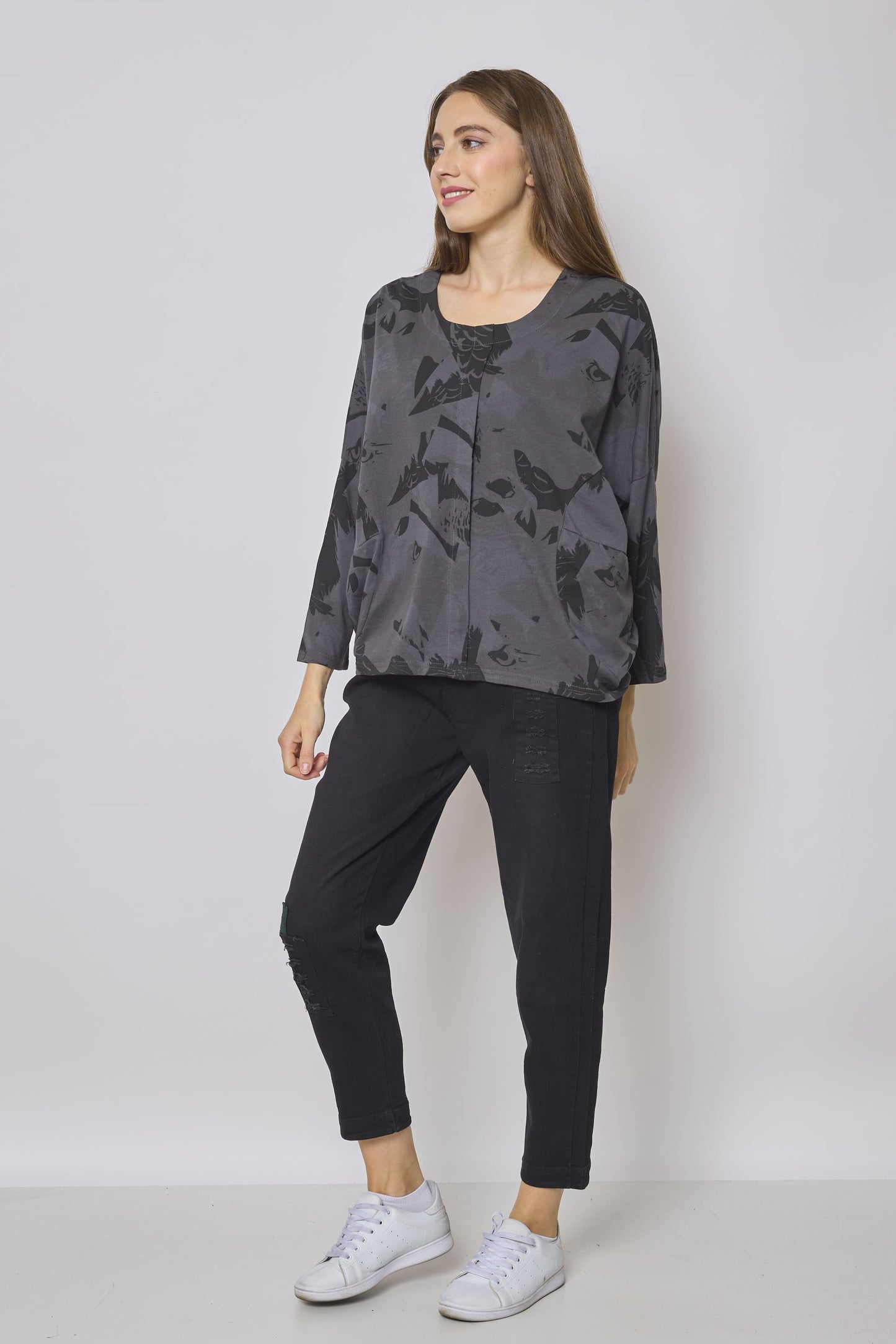 Blusa in cotone fantasia aquila