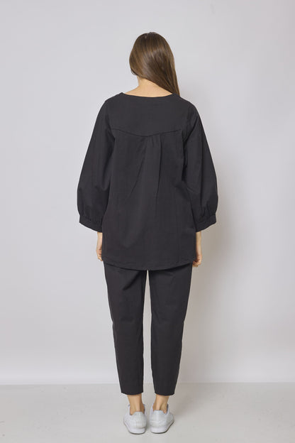 Blouse noire à motifs manche bouffante