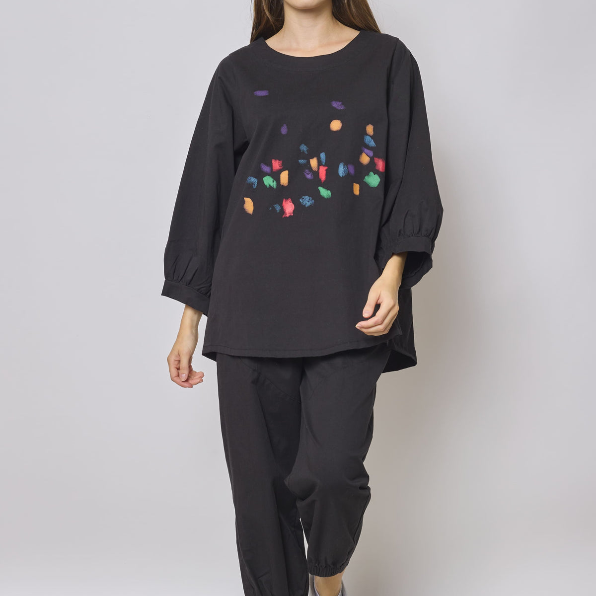 Blouse noire à motifs manche bouffante