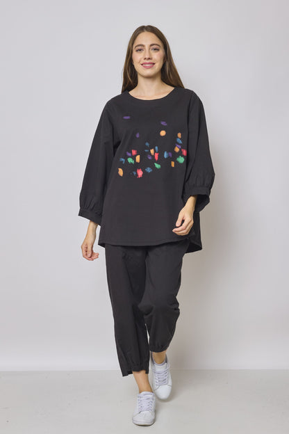 Blouse noire à motifs manche bouffante