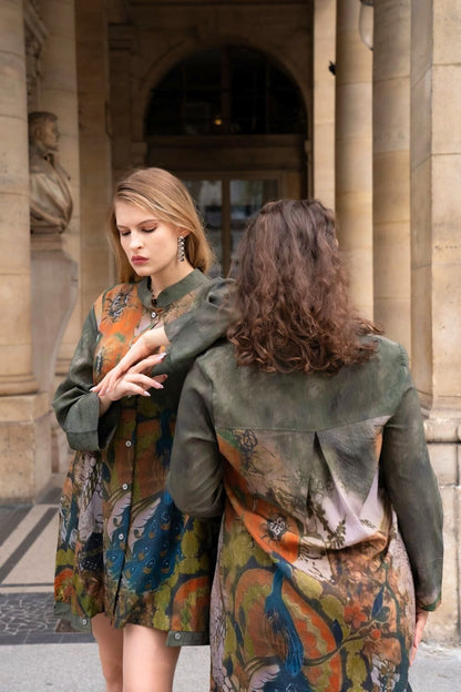 Short green shirt with peacock patterns