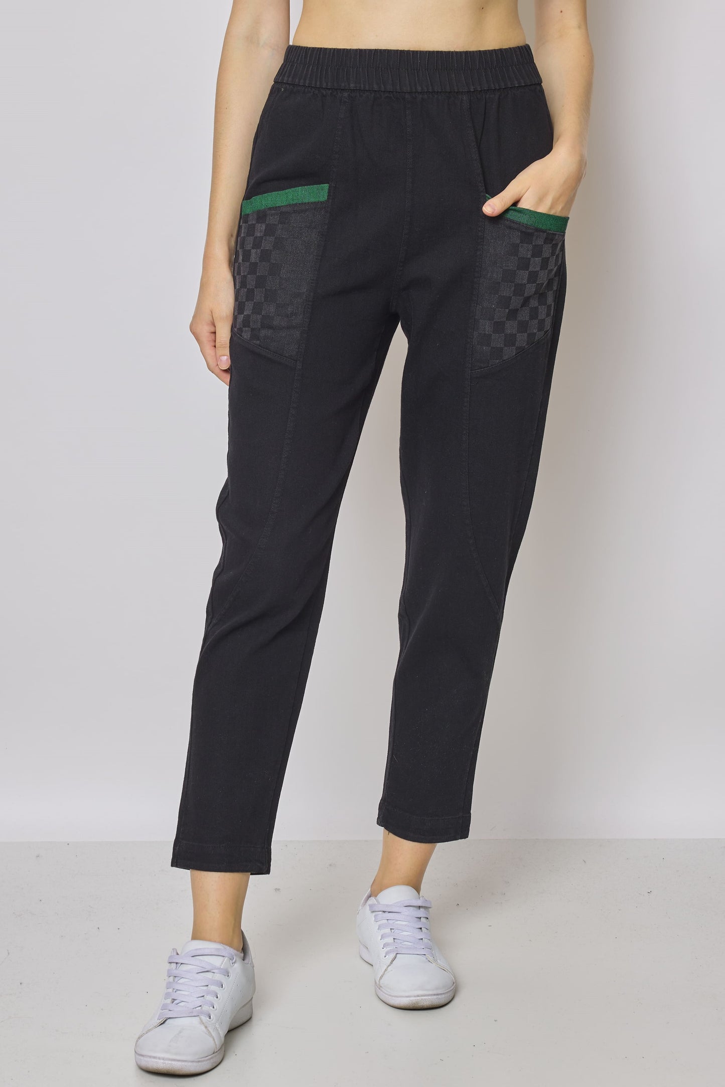 Black jeans with checkerboard pattern pockets