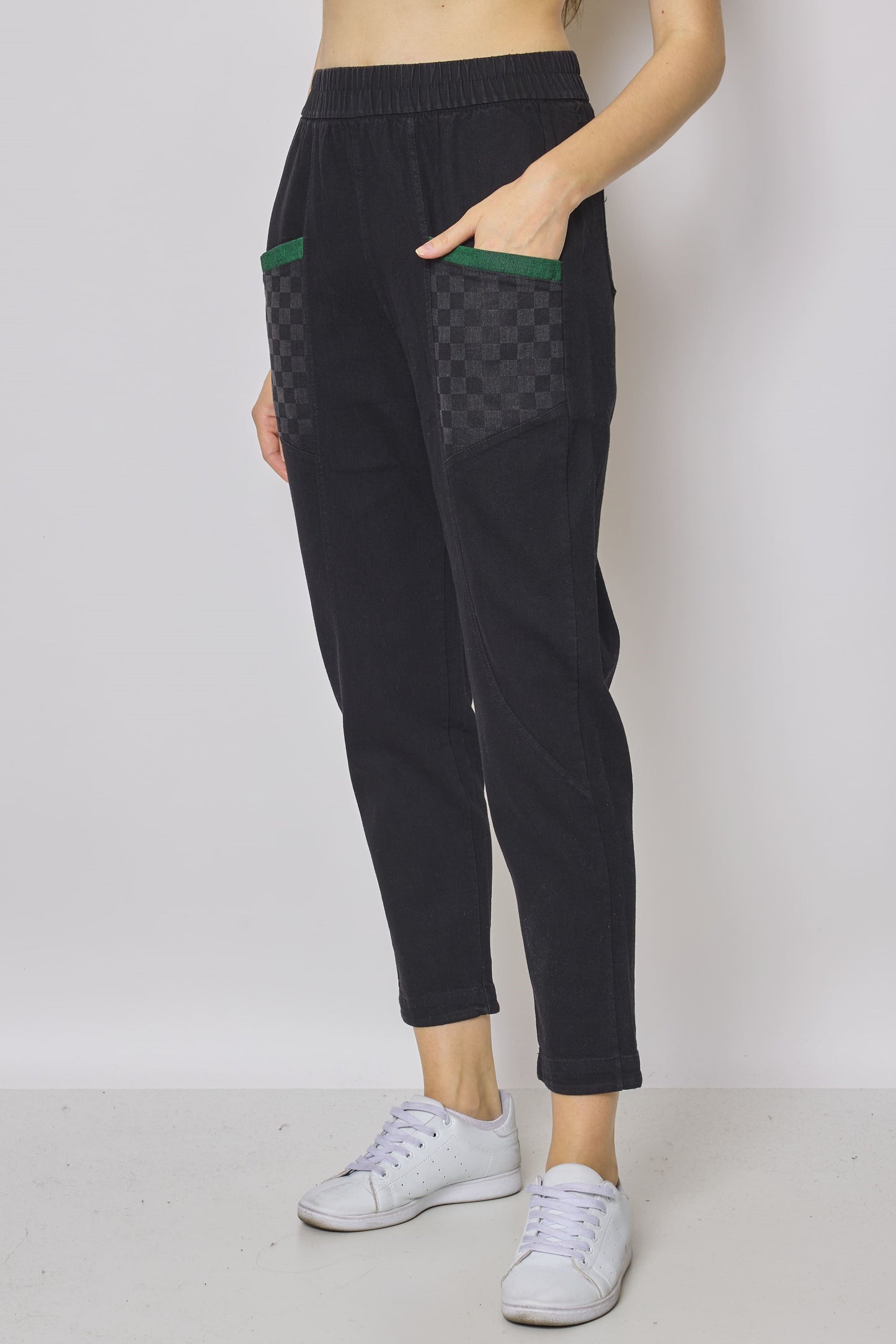 Black jeans with checkerboard pattern pockets