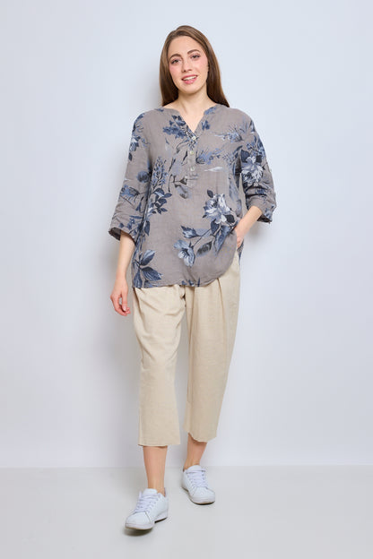 Blouse fleurie avec boutons et col effet cravate