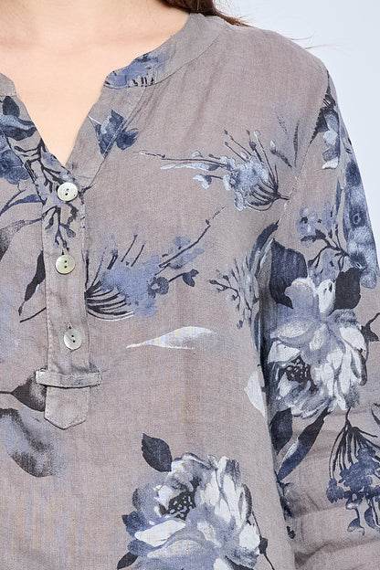 Floral blouse with buttons and tie effect collar