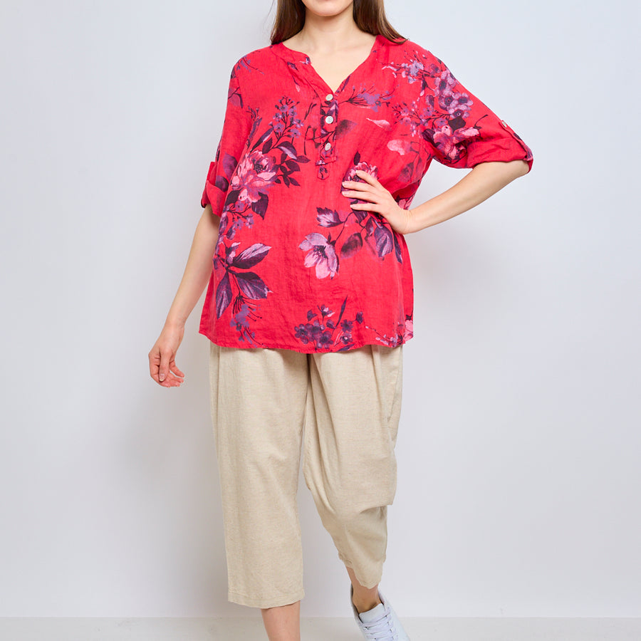 Blouse fleurie avec boutons et col effet cravate