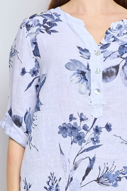 Floral blouse with buttons and tie effect collar