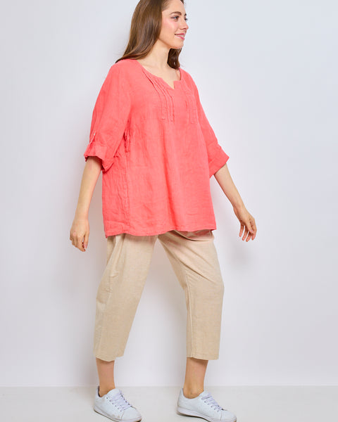 Top en lin avec col en V inversé et garniture brodée