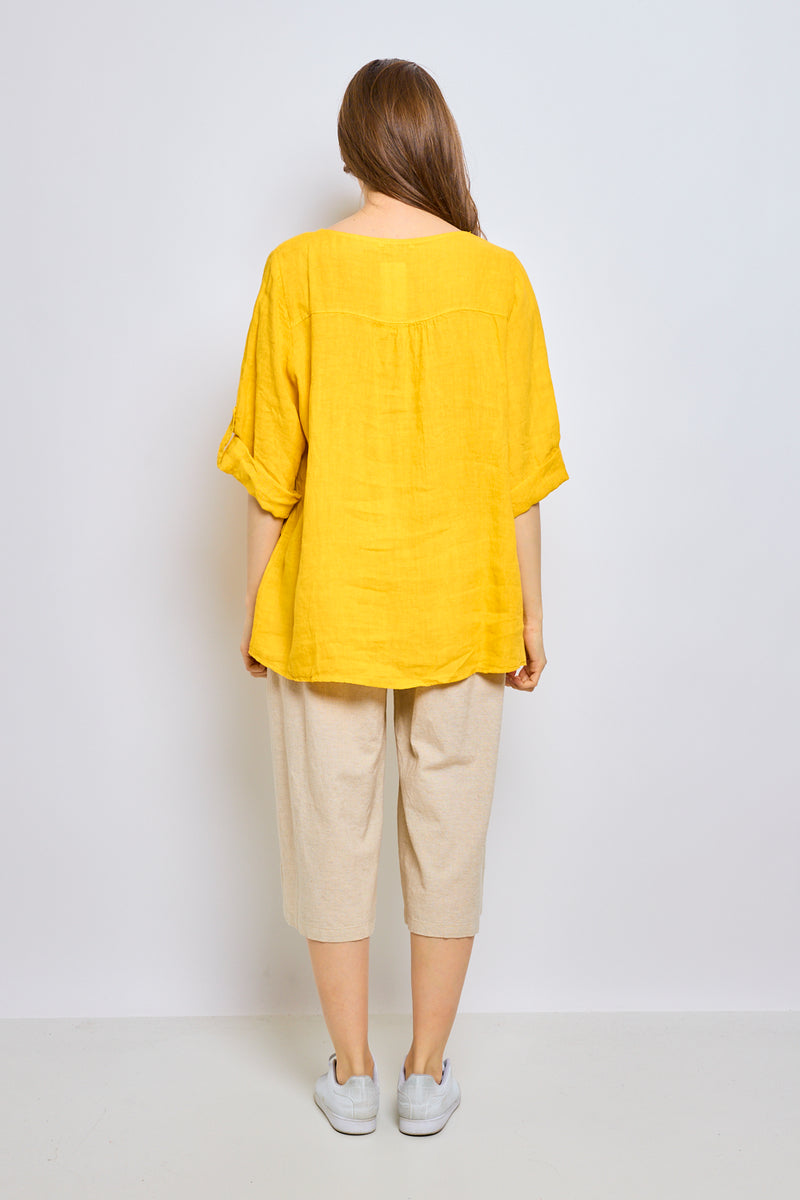 Top en lin avec col en V inversé et garniture brodée