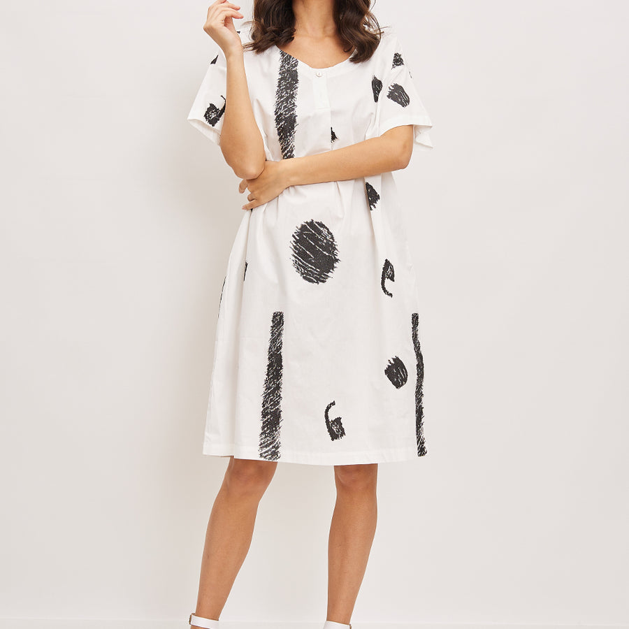 Short dress with faded patterns