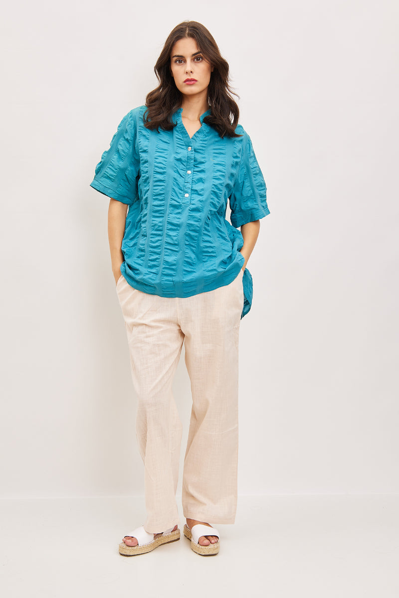 Blouse asymétrique à plis