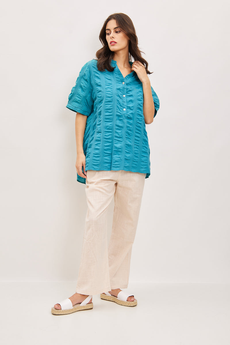 Blouse asymétrique à plis