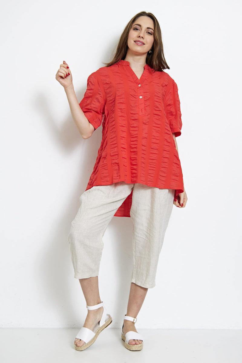 Blouse asymétrique à plis