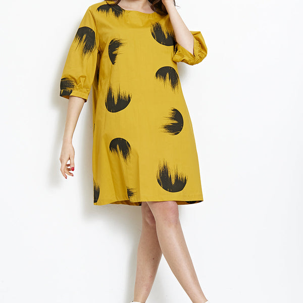 Abito sgargiante con fantasia a cerchi