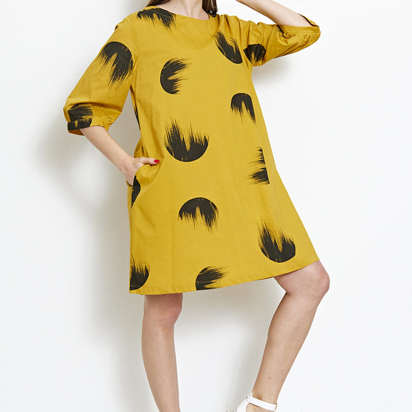 Abito sgargiante con fantasia a cerchi