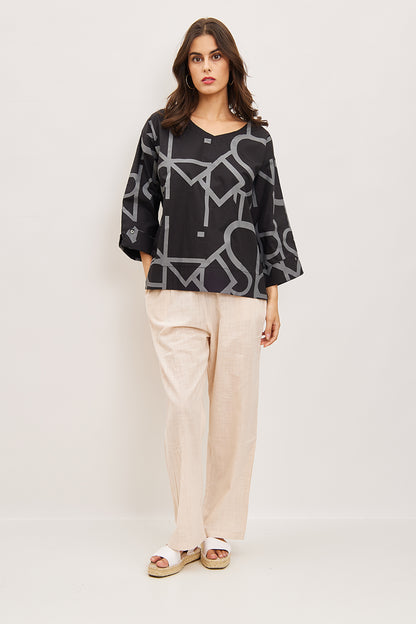 Blouse with straight and rounded patterns