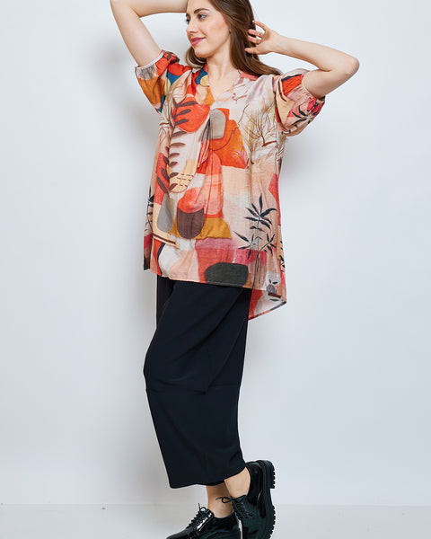 Top orangé aux couleurs vibrantes