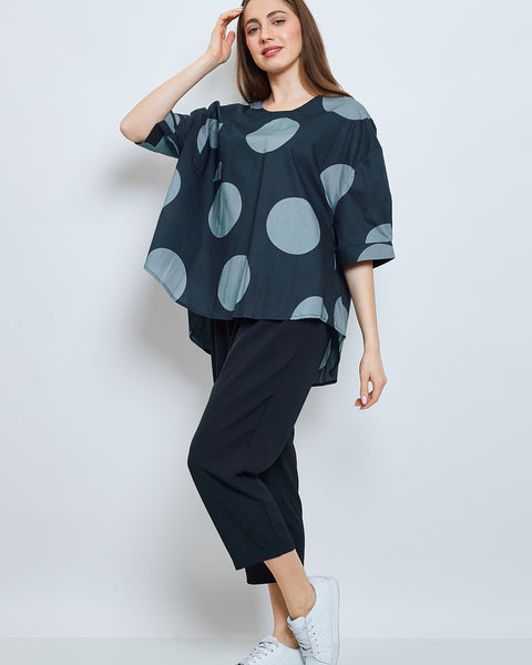 Blouse à ronds bleus