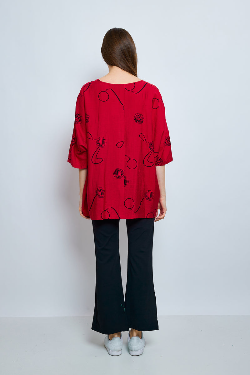 Blouse aux imprimés en forme de balles