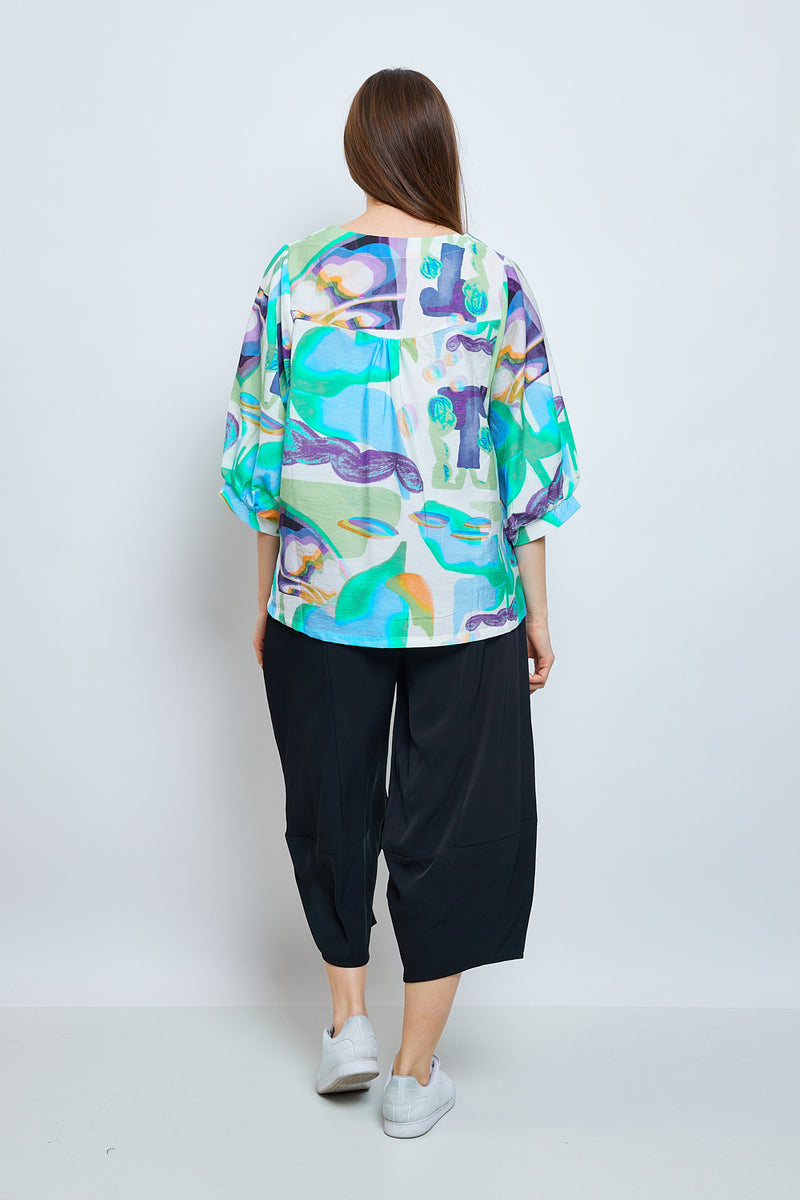 Blusa pastel turquesa