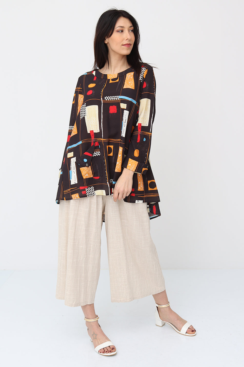 Brown blouse with geometric shapes