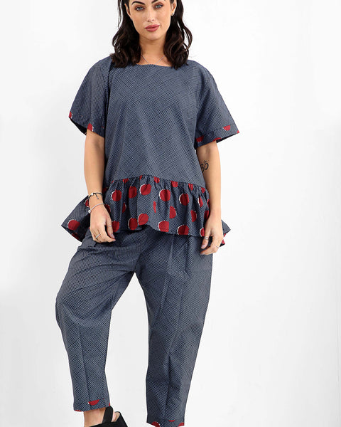 Haut quadrillé à ronds rouges