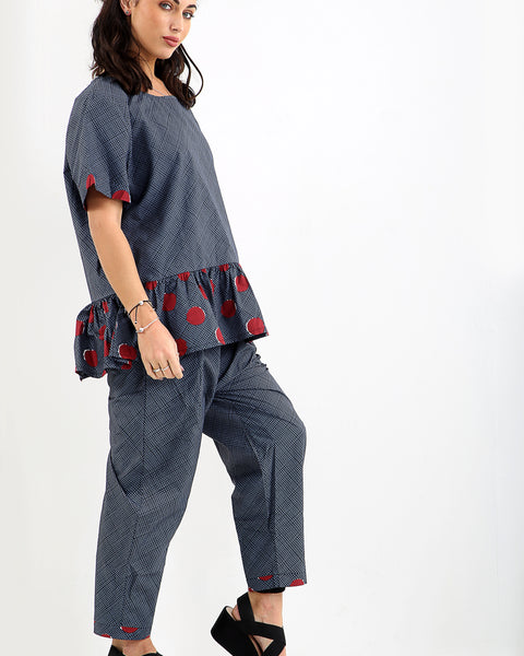 Haut quadrillé à ronds rouges