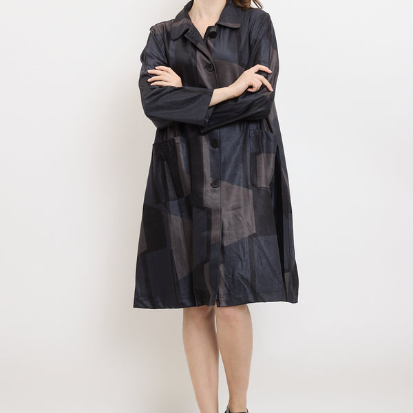 Cappotto con bottoni e fantasia a trapezio