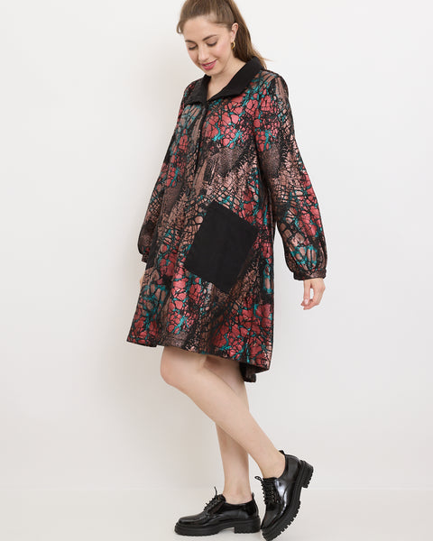 Manteau aux motifs pierreux